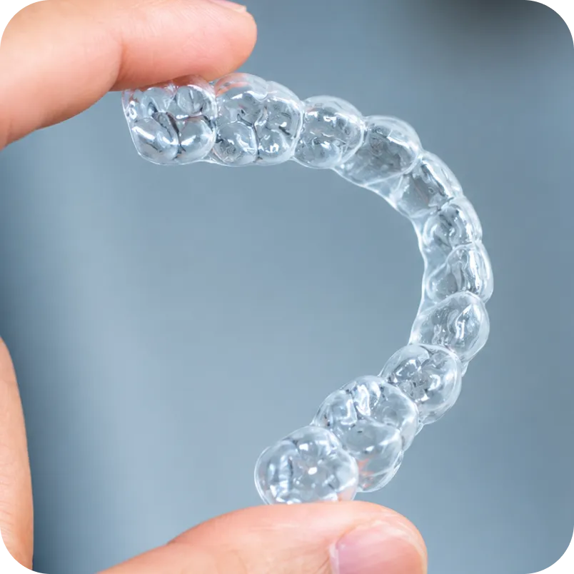Transparent dental aligner tray